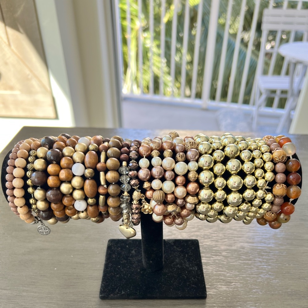 25 ASSORTED BEADED BRACELETS